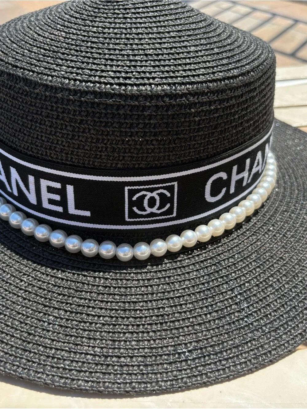 CHANEL Black Straw Hat with Logo Band and Pearl Trim - Picture 5 of 5